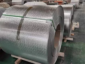 Aluminum coil embossed in stucco pattern for thermal barrier applications